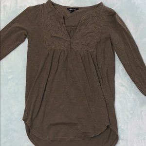 Army green 3/4 sleeve shirt.